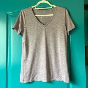 Nike DRI-FIT short sleeve workout shirt Woman’s Size Large / Purple